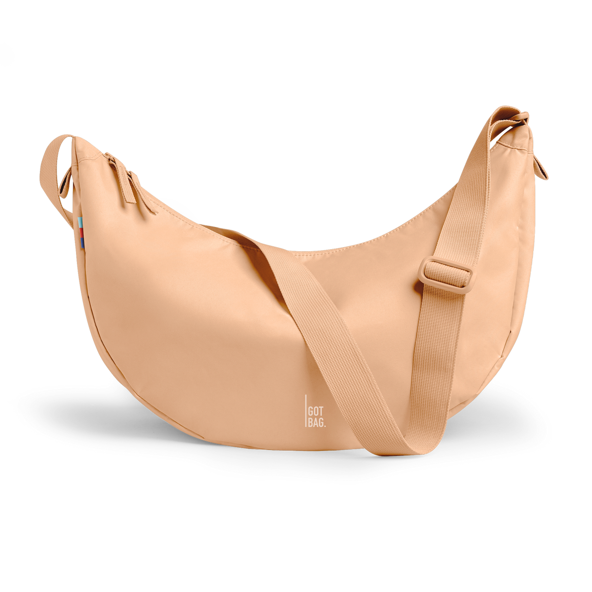 MOON BAG LARGE bag in krill (Fresh Pastel Peach Tone), studio shot, front view.