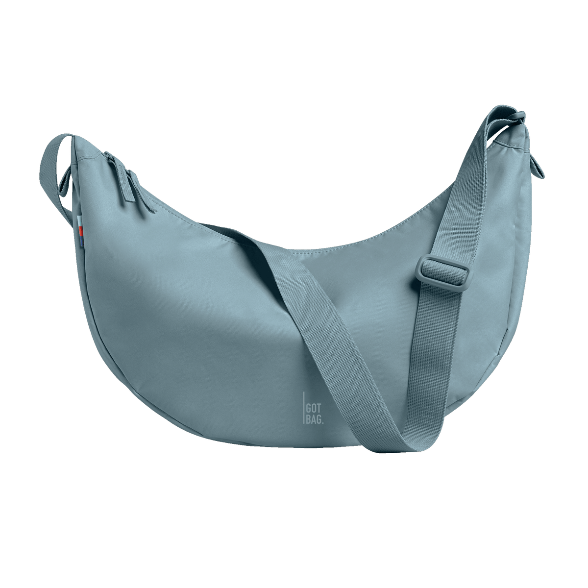 MOON BAG LARGE bag in salty blue (Light Blue with a Gray Undertone), studio shot, front view.