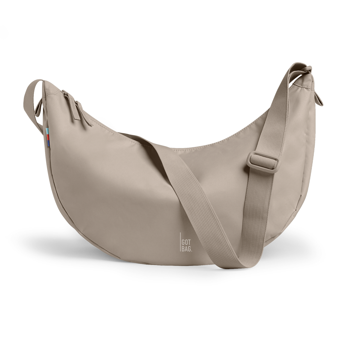 MOON BAG LARGE bag in scallop (Light Beige), studio shot, front view.