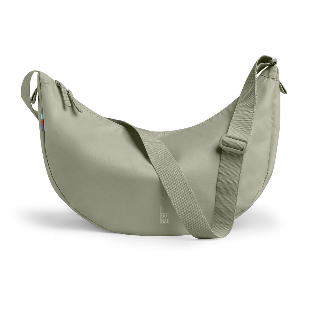 MOON BAG LARGE bag in seabed (Light Olive Green), studio shot, front view.