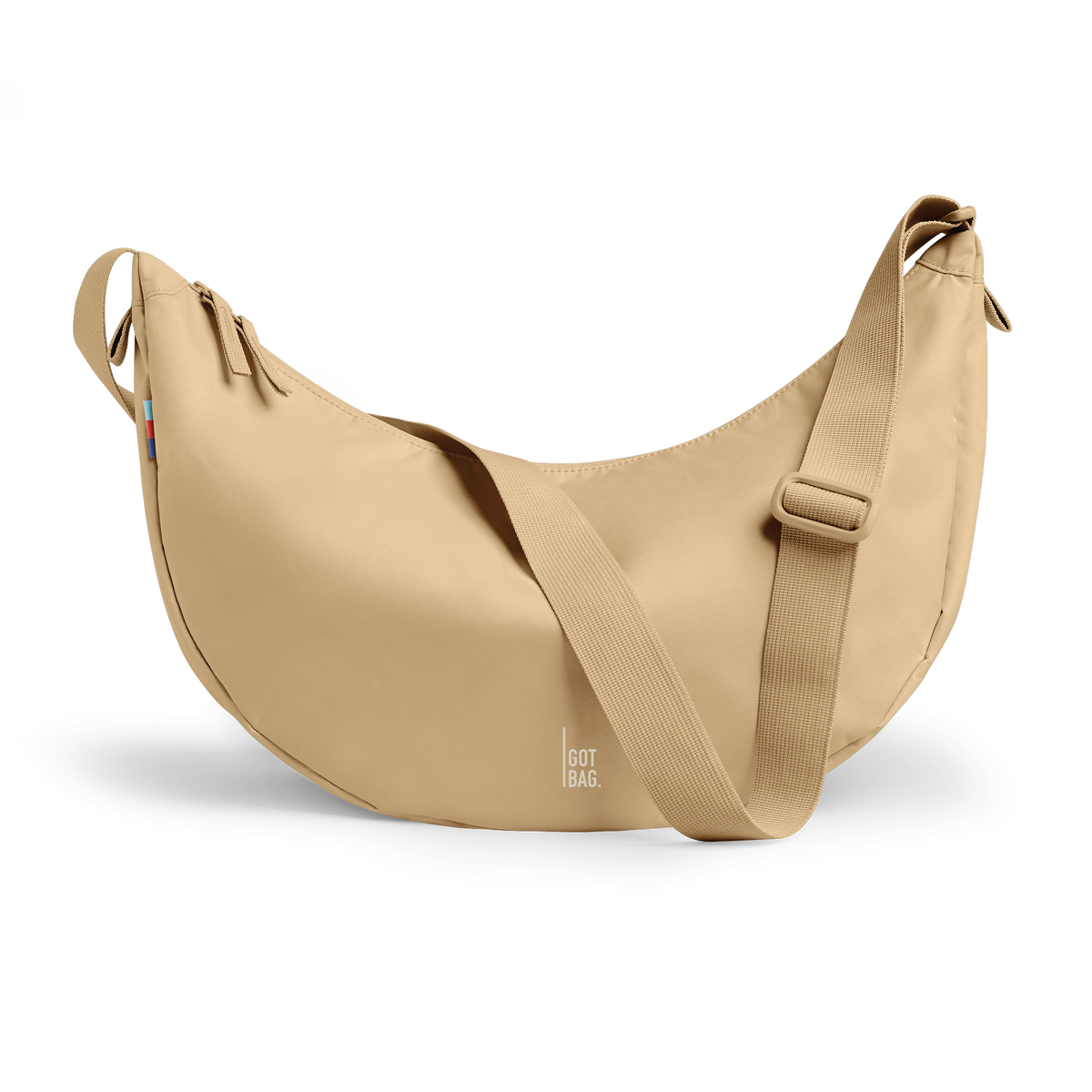 MOON BAG LARGE bag in shore (Warm Sand Tone), studio shot, front view.