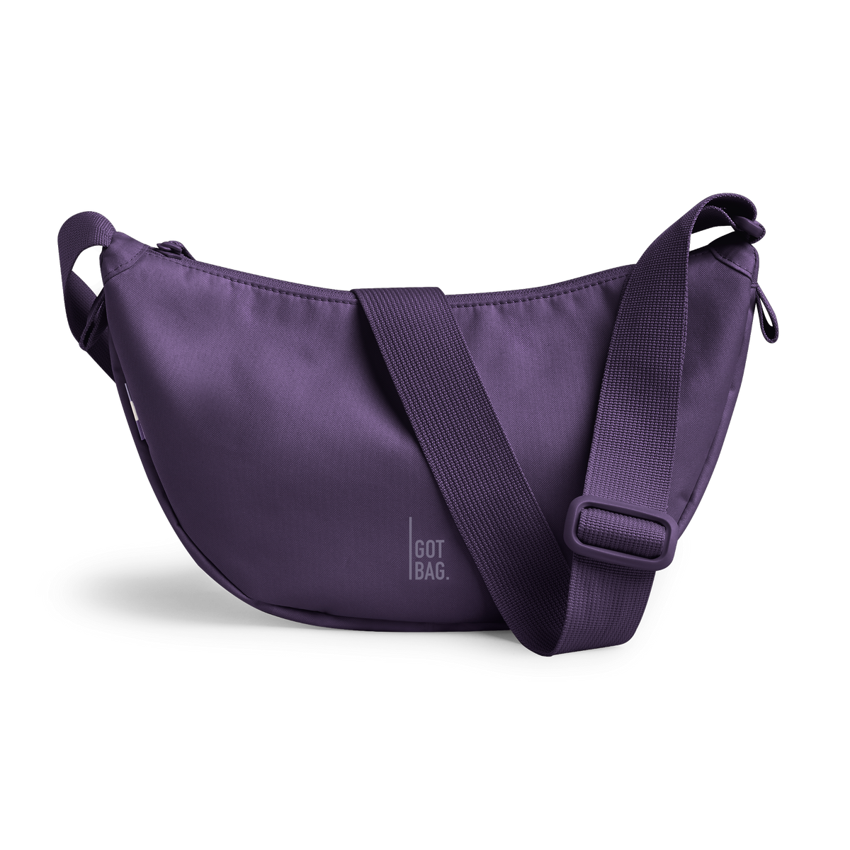 MOON BAG SMALL bag in ocean dusk (Bold Dark Purple), studio shot, front view.
