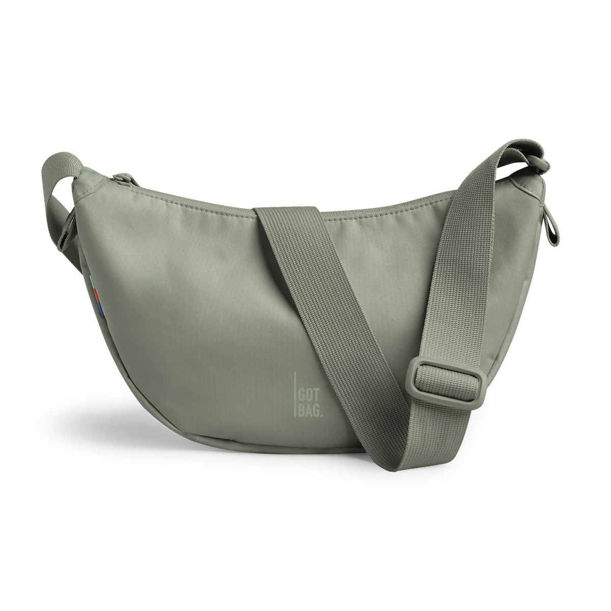 MOON BAG SMALL bag in bass (Sage Green), studio shot, front view.