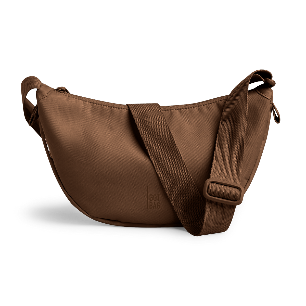 MOON BAG bag in trench (Warm Golden Brown), studio shot, front view.