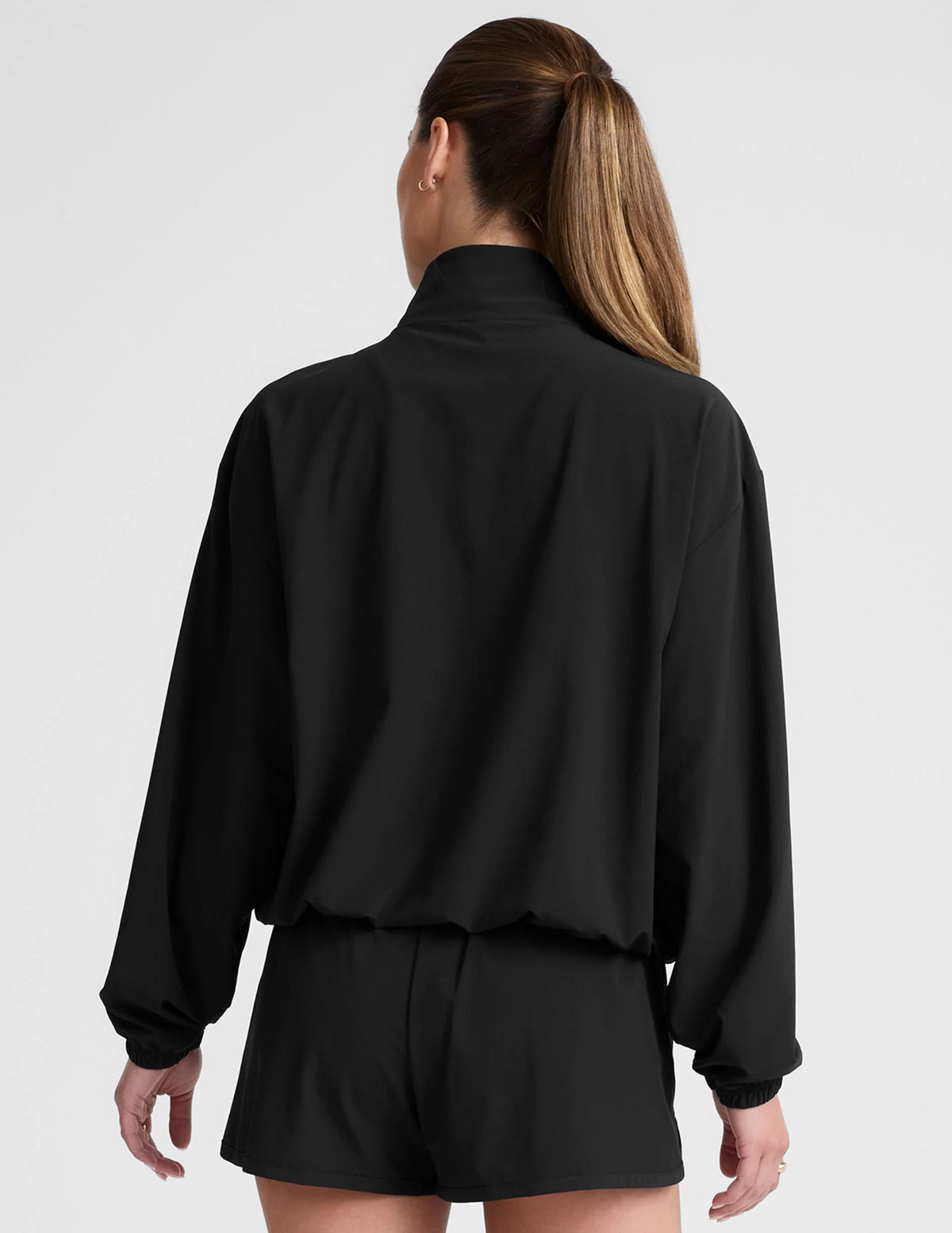 Stretch Woven In Stride Half Zip Pullover