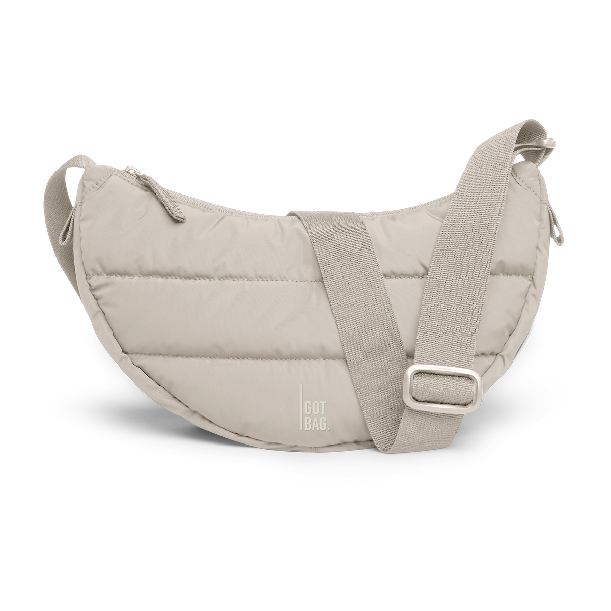 PUFFER MOON BAG SMALL bag in scallop (Light Beige), studio shot, front view.