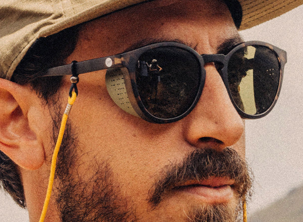 RICH close up of man wearing sunski tera sunglasses