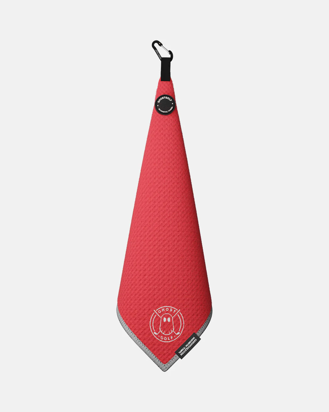 Product shot of Red Ghost Golf Magnetic Greenside Towel with emblem logo near the bottom and carabiner clip at the top #color_red