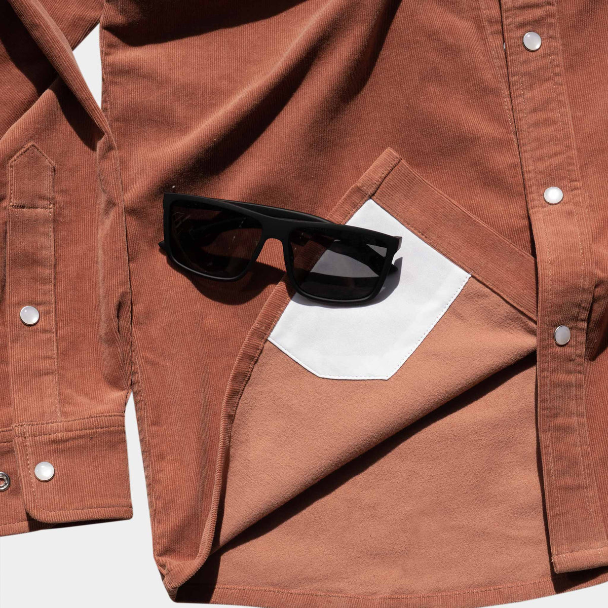 closeup of lens cloth on shirt