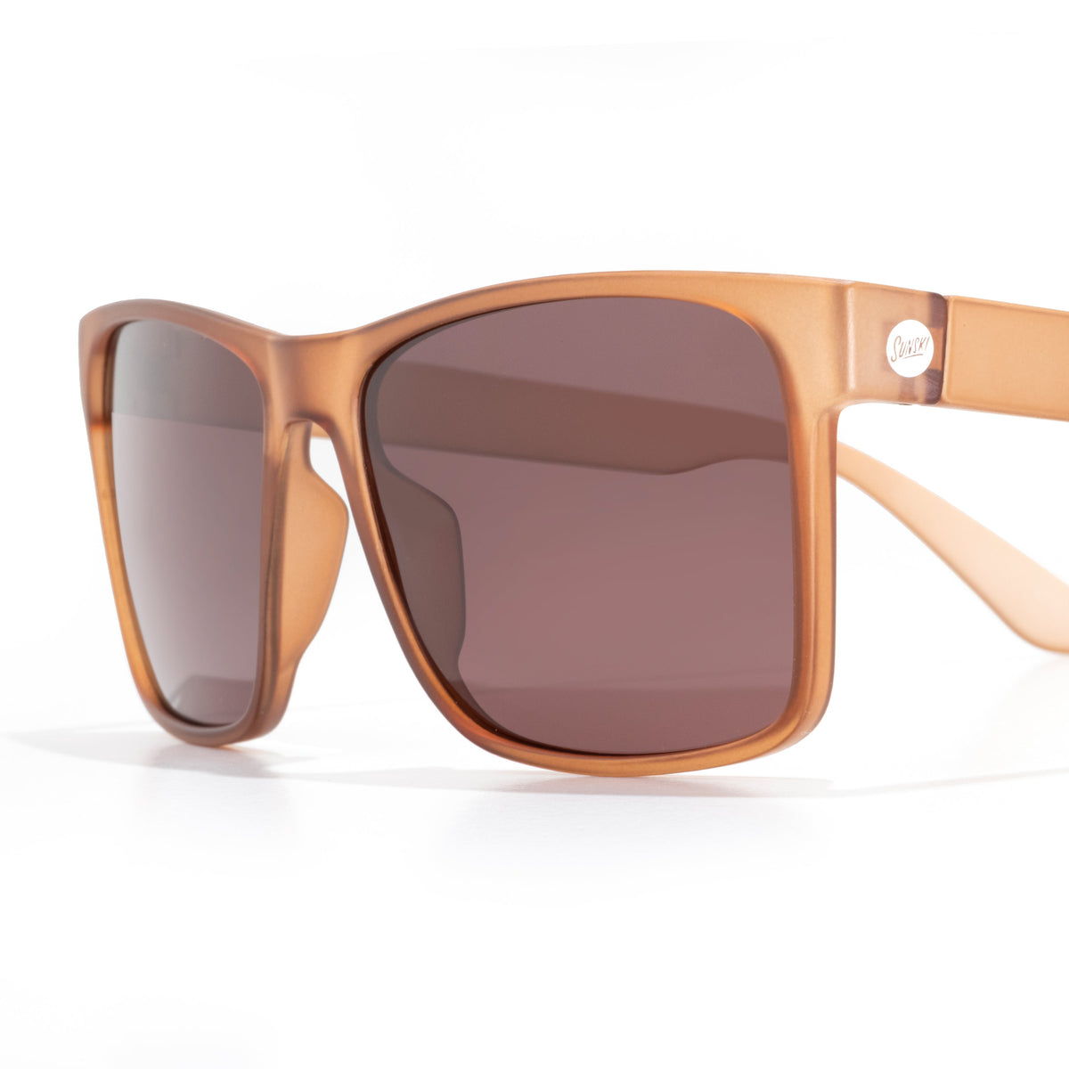 Sunglasses with brown frames and lenses on a white background
