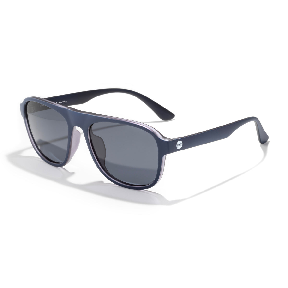 Sunglasses with black lenses and gold frame on a white background