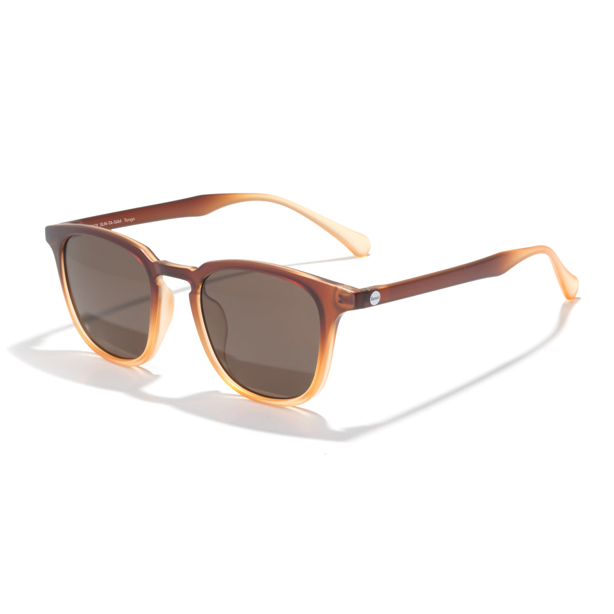 Sunglasses with brown frame and dark lenses on a white background
