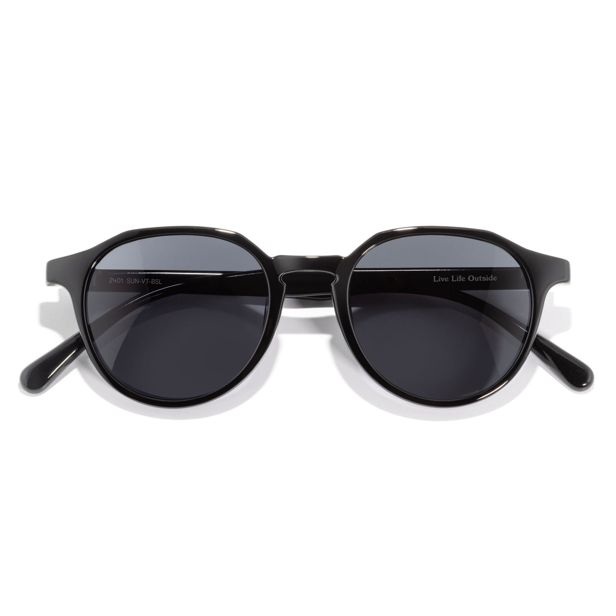 Black sunglasses with dark lenses on a white background