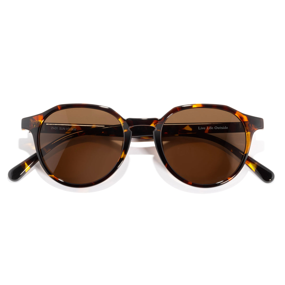 Sunglasses with tortoiseshell frame and brown lenses on a white background
