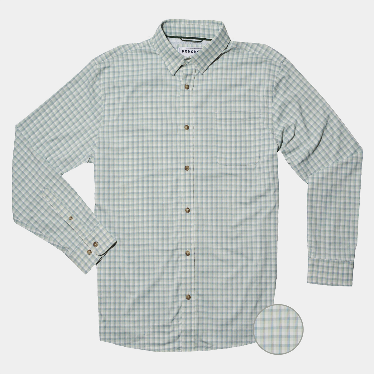 flat lay of green plaid button up shirt