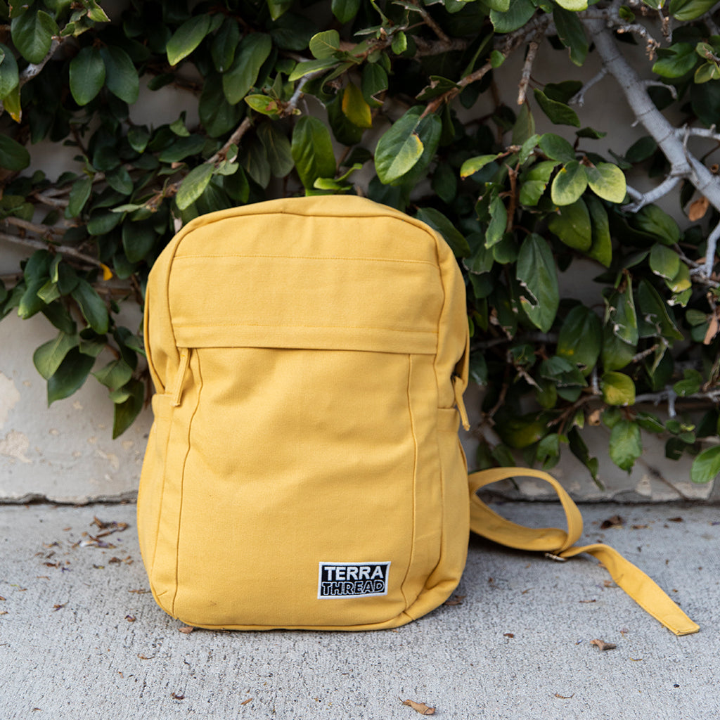 yellow canvas backpack#color_mustard-yellow
