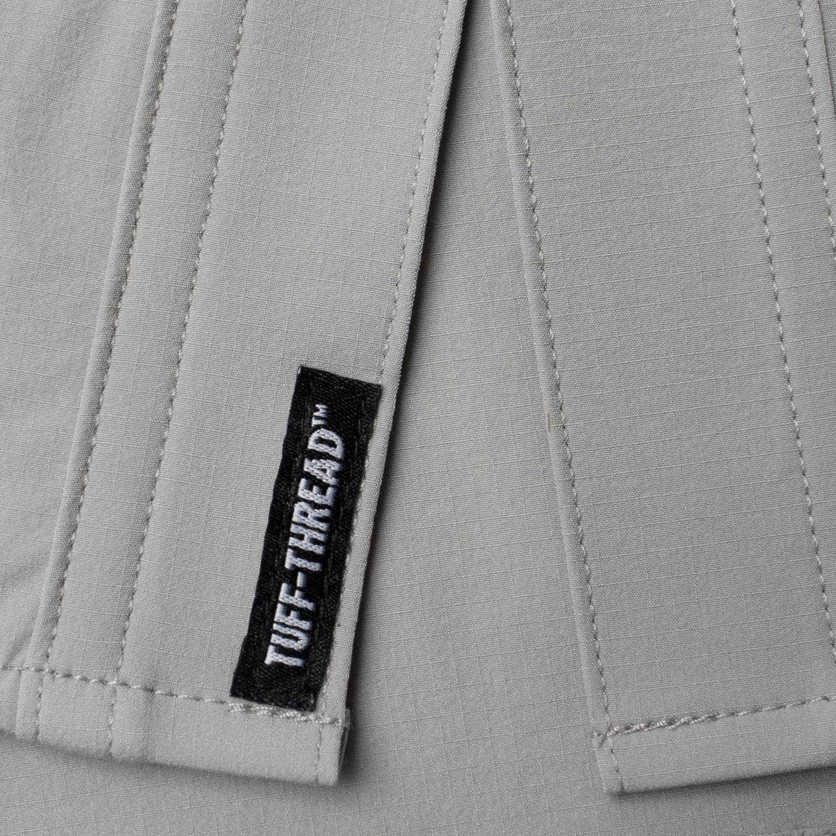 Tuff Thread tag on the bottom of the shirt