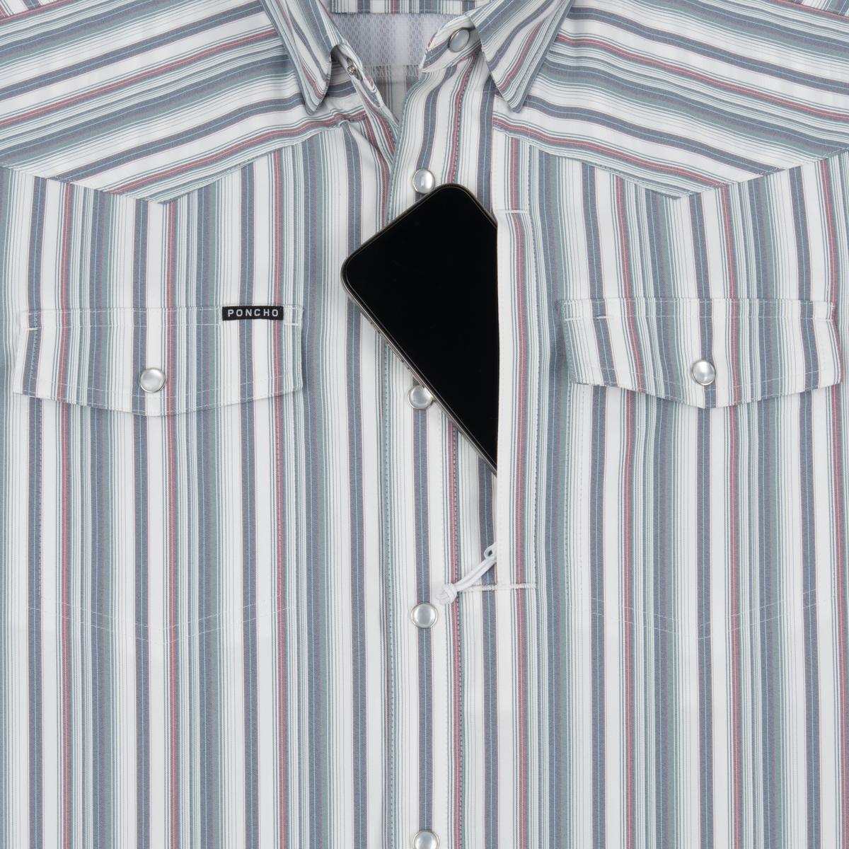 Phone in chest zipper pocket of shirt