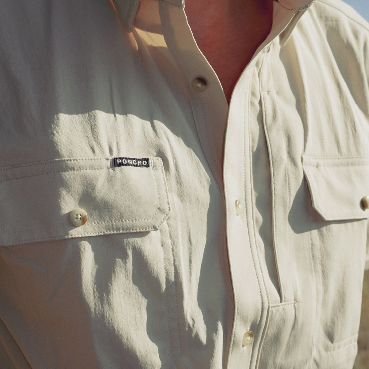man wearing the brown bear shirt
