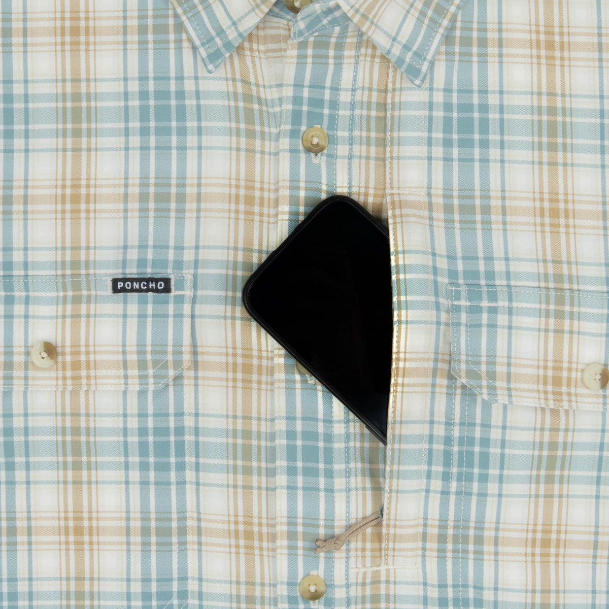 phone in chest zipper pocket of shirt