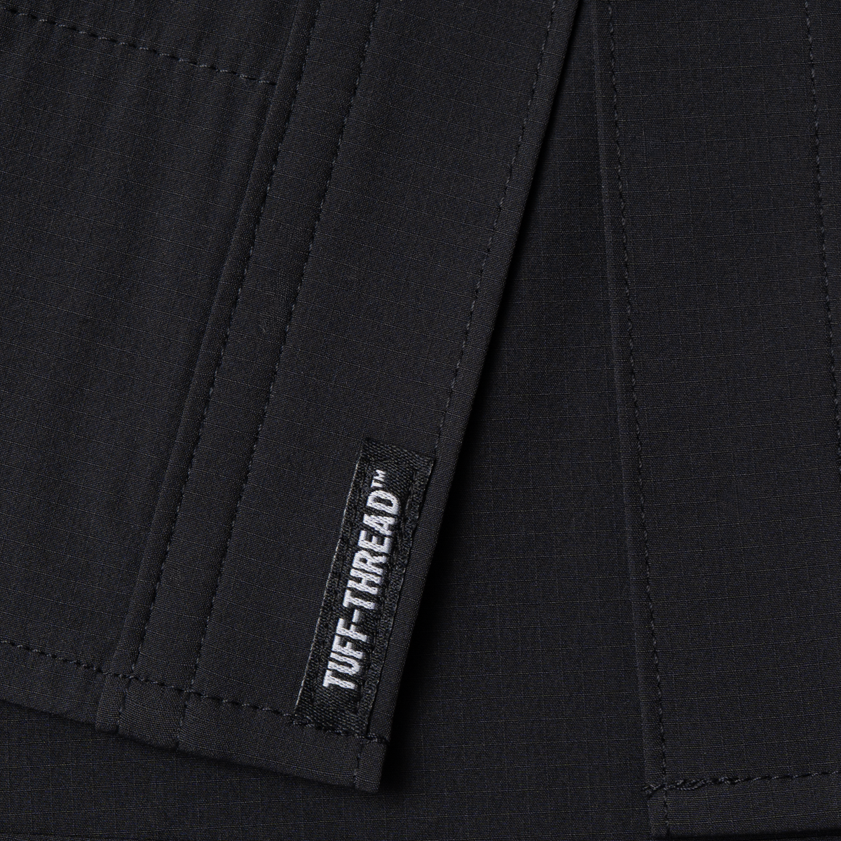 Photo of Tuff-Thread logo tag at bottom of shirt