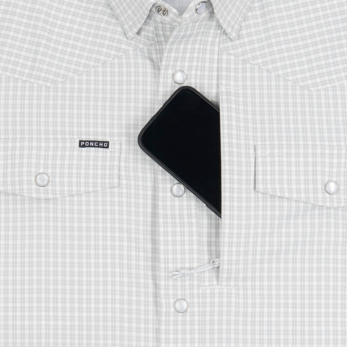 phone in chest zipper pocket of shirt