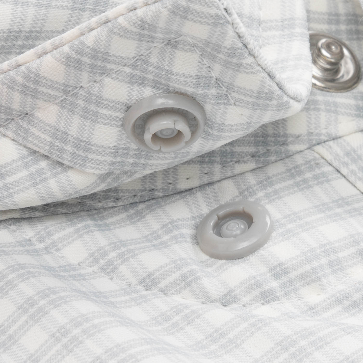 closeup of collar snaps on shirt