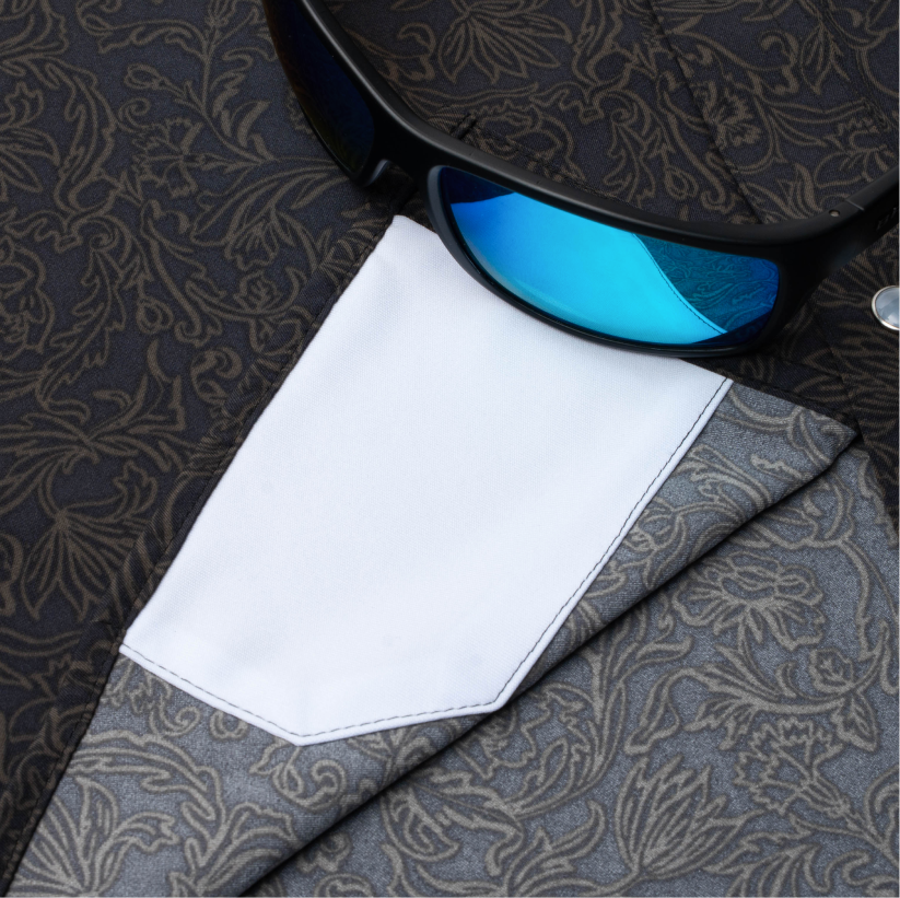 sunglasses with lens cleaner on shirt