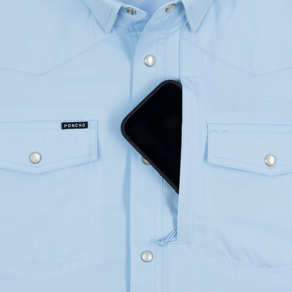 phone in chest zipper pocket of shirt