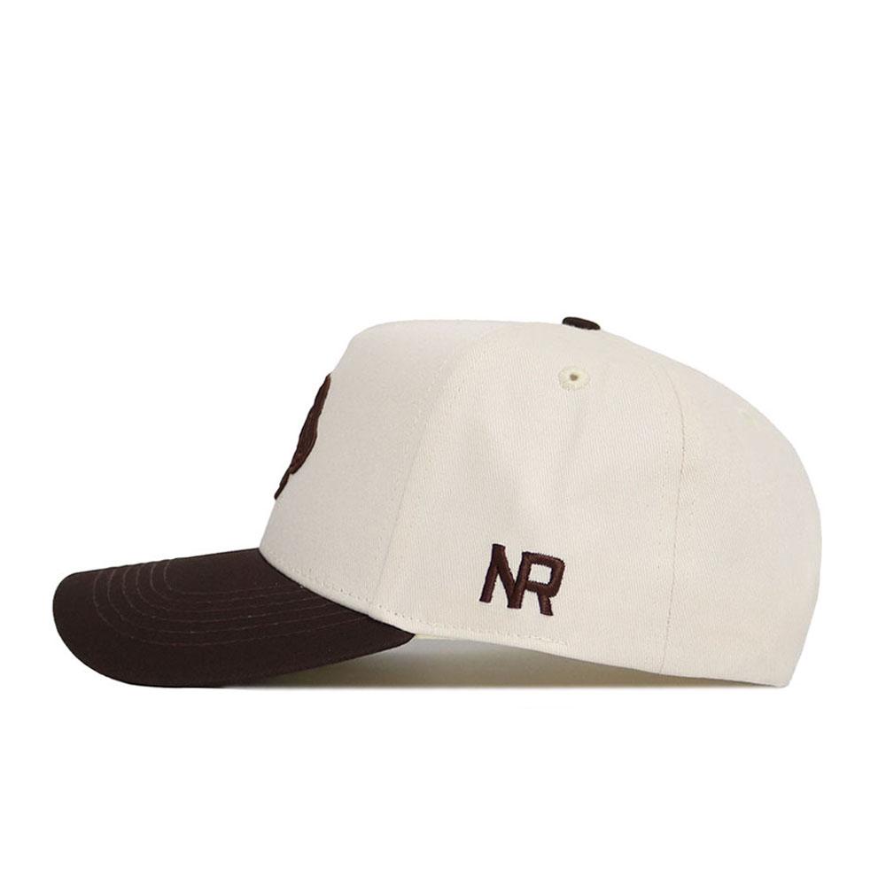 The No Rivals Boise State Espresso Hat is a beige cotton snapback with a dark brown brim and "NR" embroidered in brown above the ear.