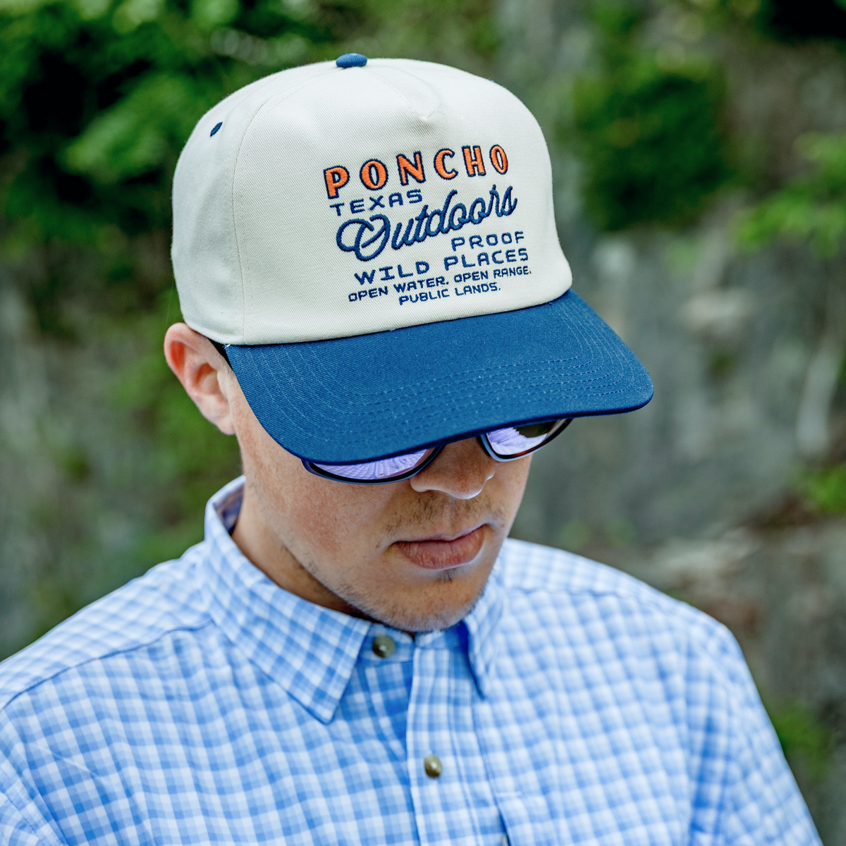 Man wearing wild places hat