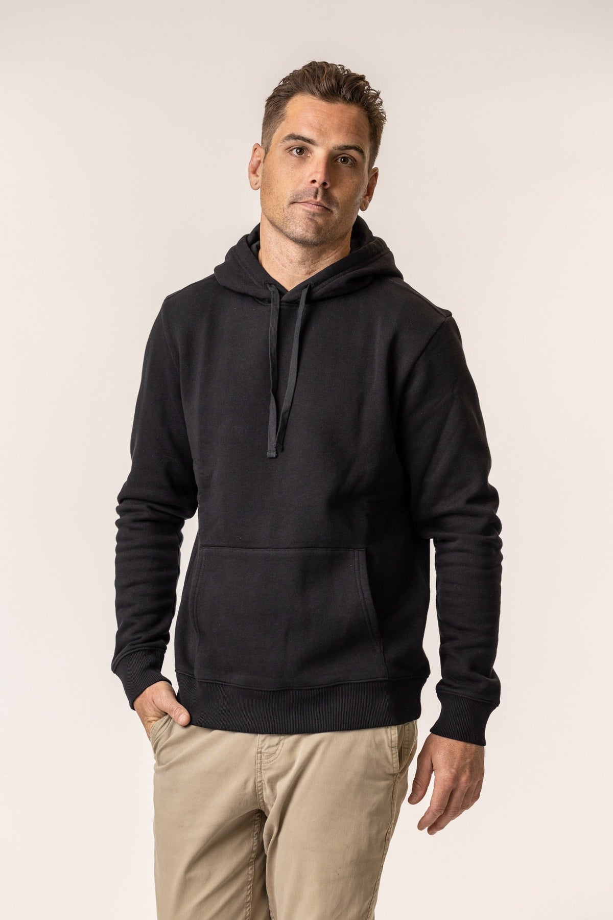 Man wearing a black pullover hoodie