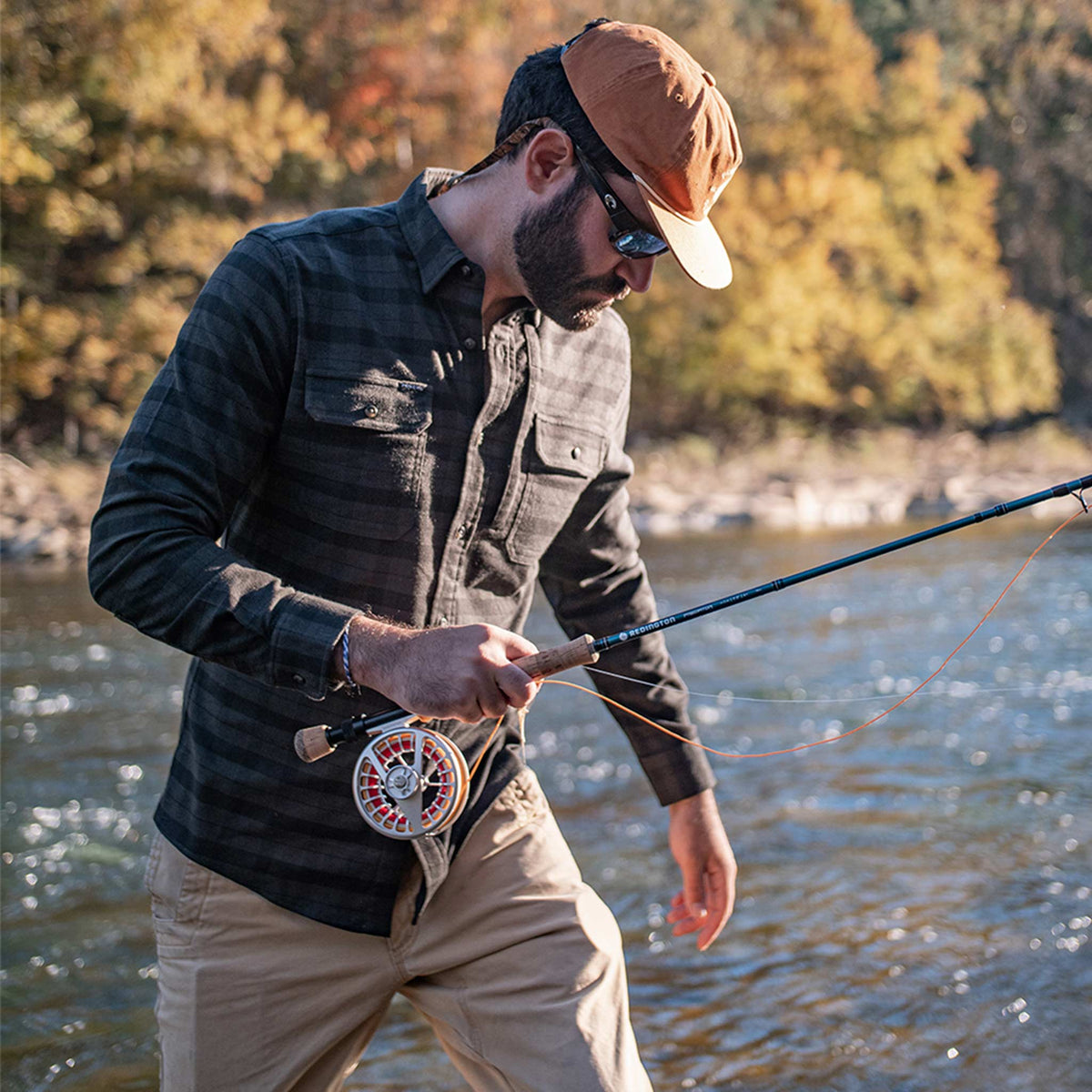 Man wearing Black checkered long sleeve flannel