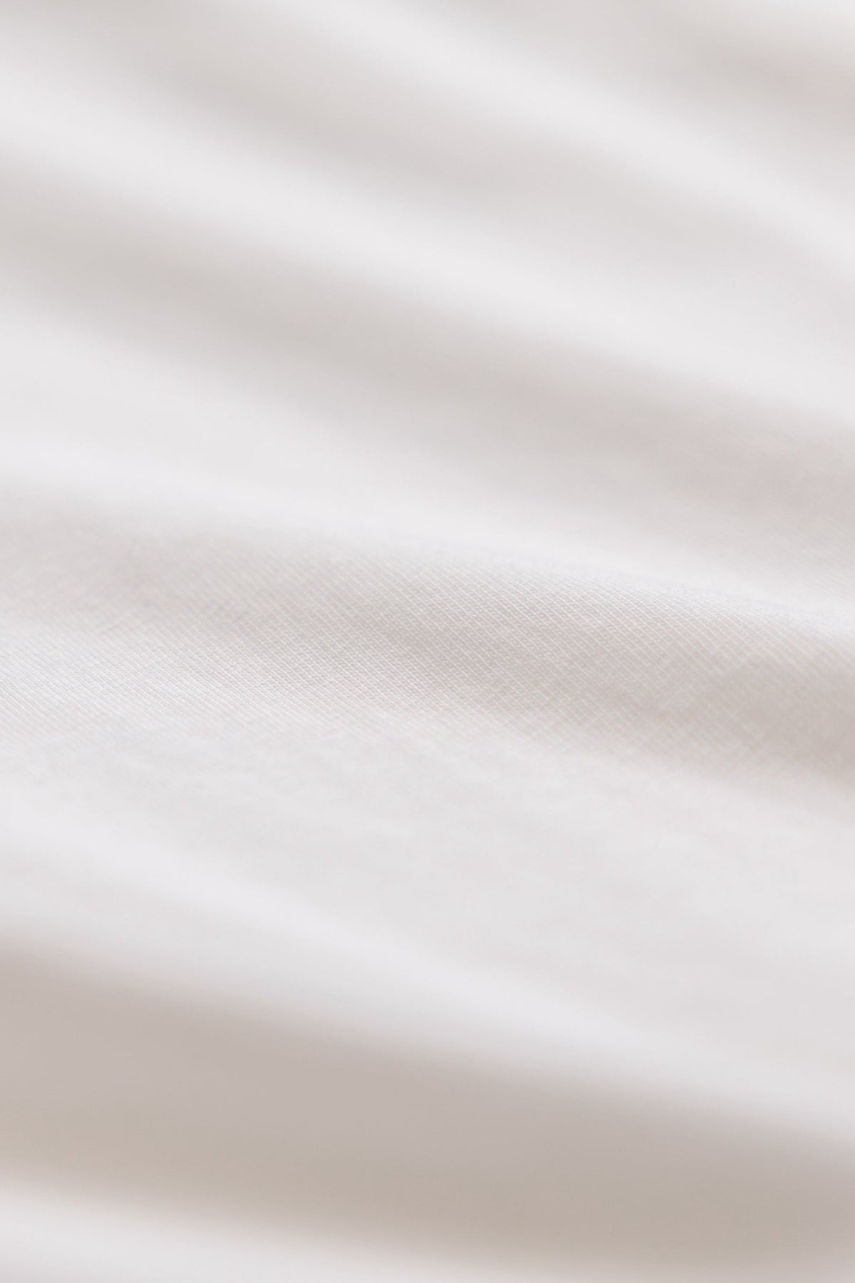 close up shot of white fabric#color_white
