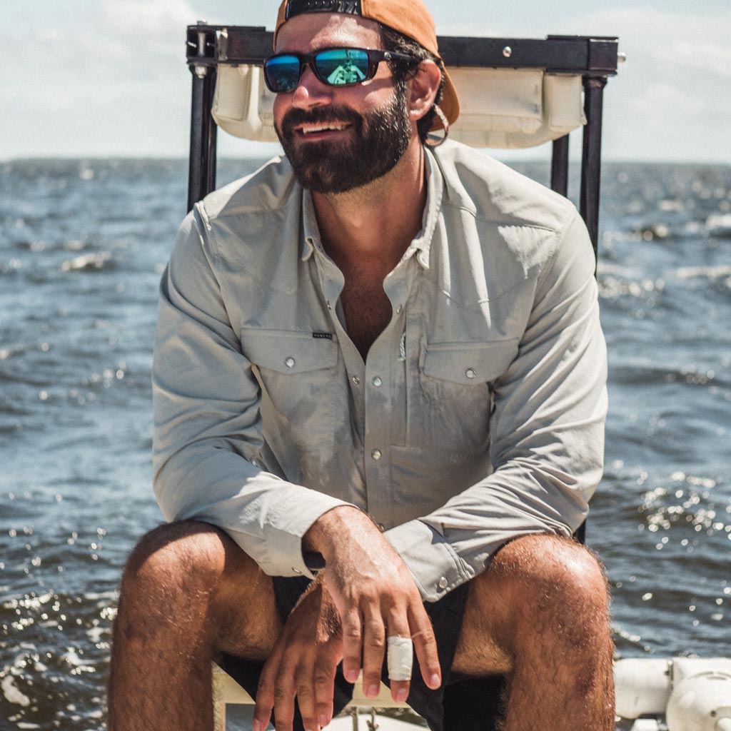 Man smiling in Grey shirt 