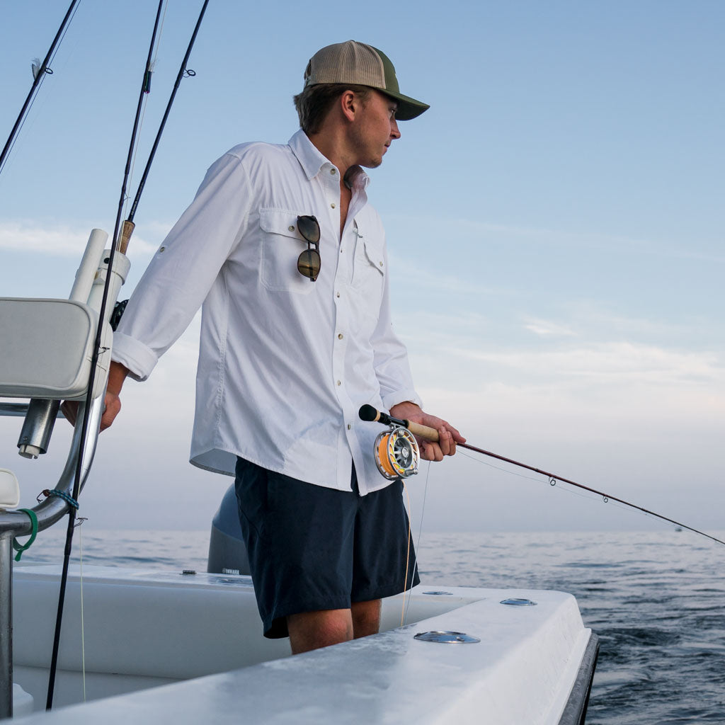 Man in white shirt, fishin 