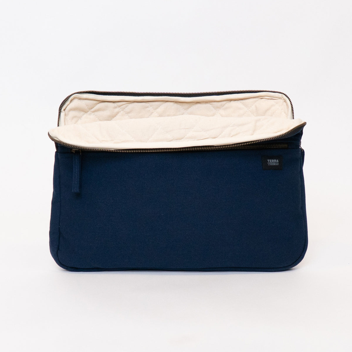quilt padded laptop sleeve in navy blue#color_navy-blue
