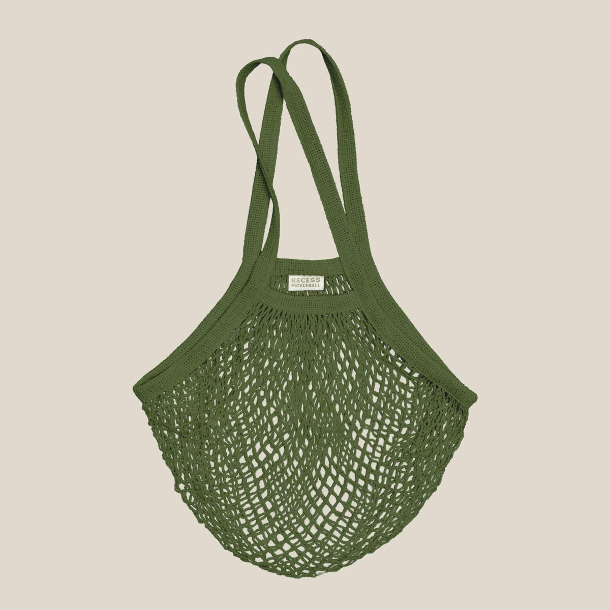 Recess Pickleball olive green cotton net court bag with Recess Pickleball label for carrying paddles and balls