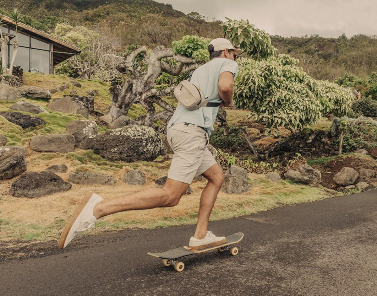 STORY guy riding skateboard wearing sunski sling