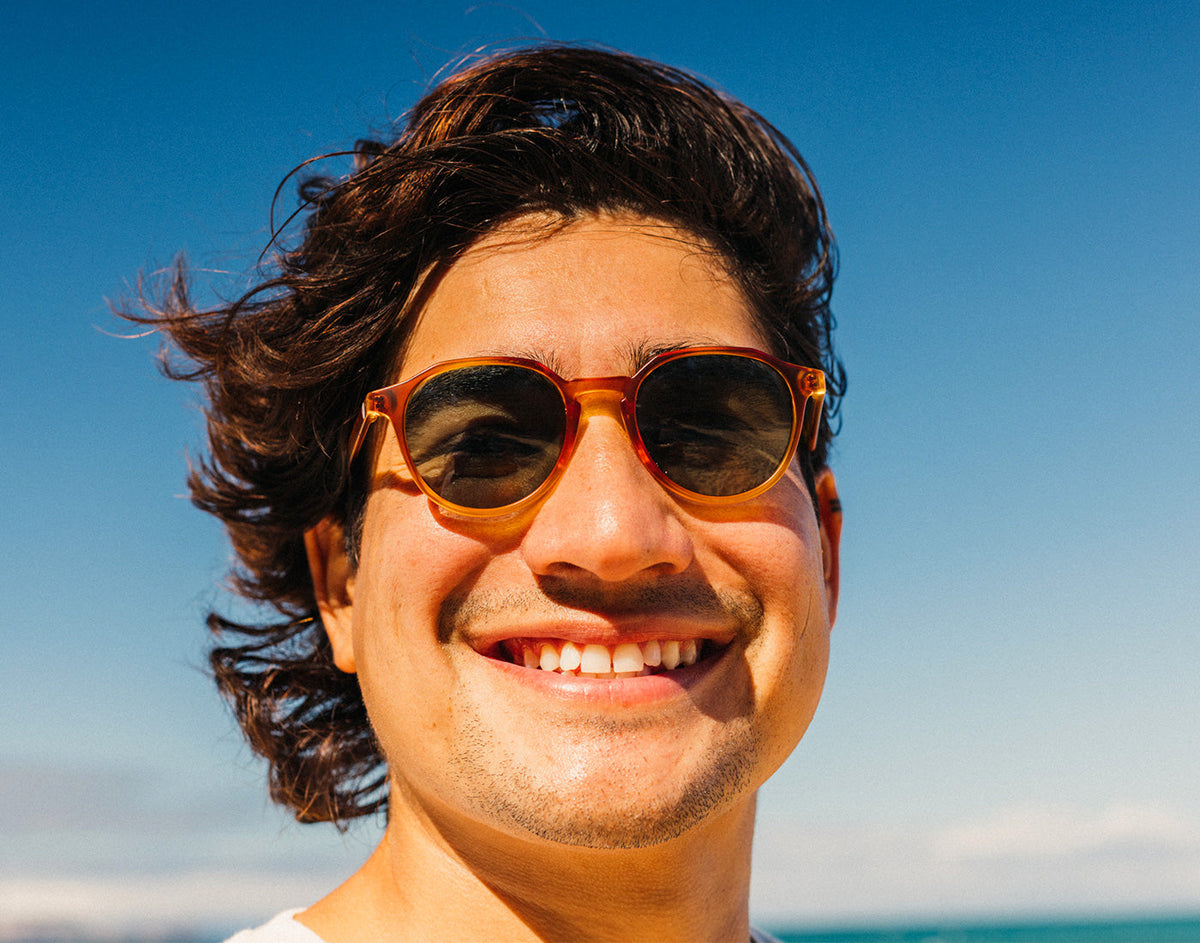 STORY guy laughing wearing sunski vallarta sunglasses