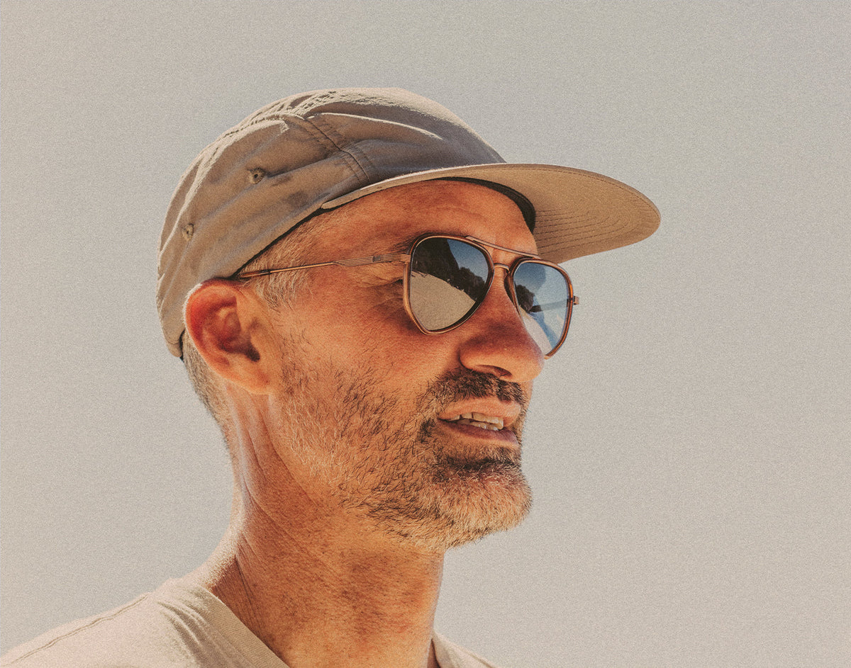 STORY profile of man wearing sunski astra sunglasses