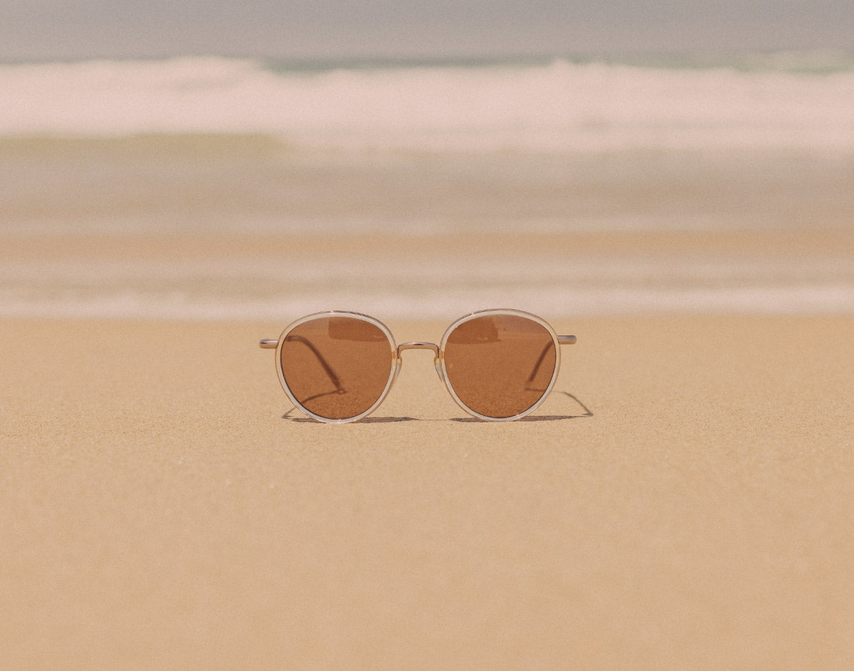 STORY sunski baia sunglasses on the sand