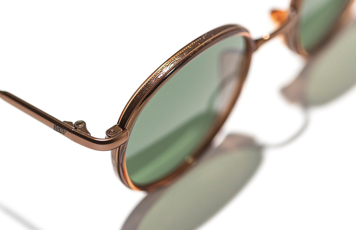 PROD_SUN_BA_COF sunski baia copper forest close up of top of frame