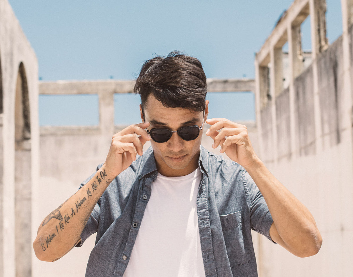 STORY guy looking down wearing sunski bernina sunglasses