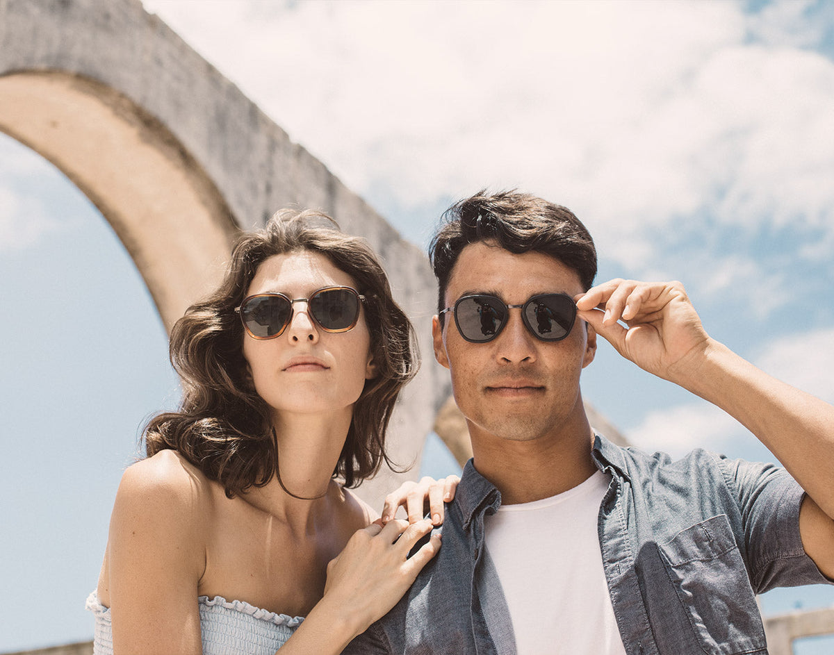 STORY guy and girl wearing sunski bernina sunglasses