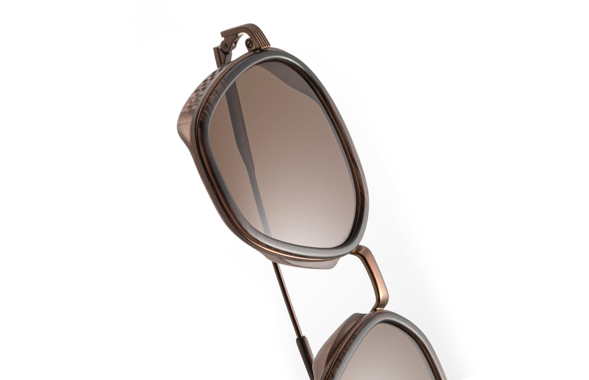 PROD_SUN_BE_WTA sunski bernina wire tortoise amber close up of lens