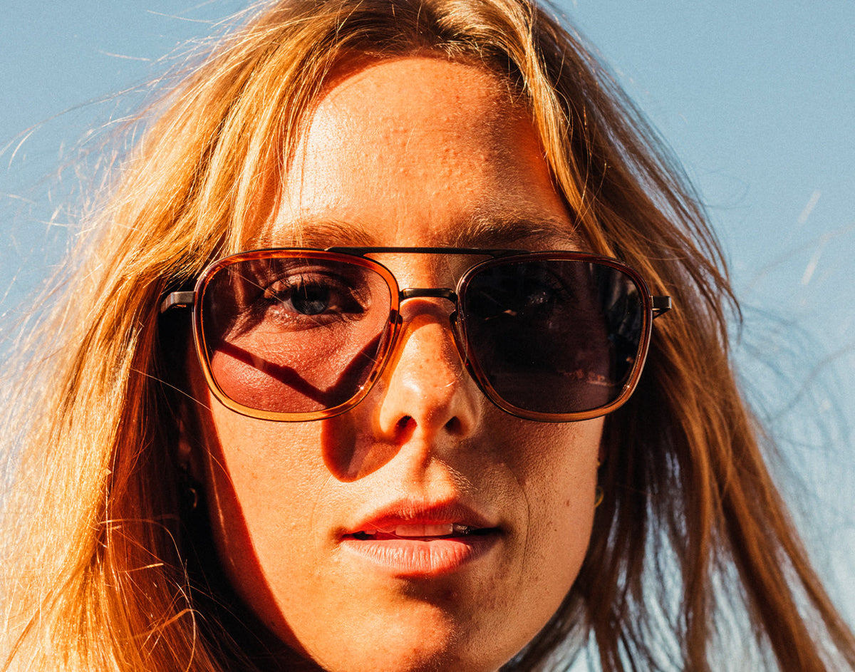 STORY close up of girl wearing sunski estero sunglasses