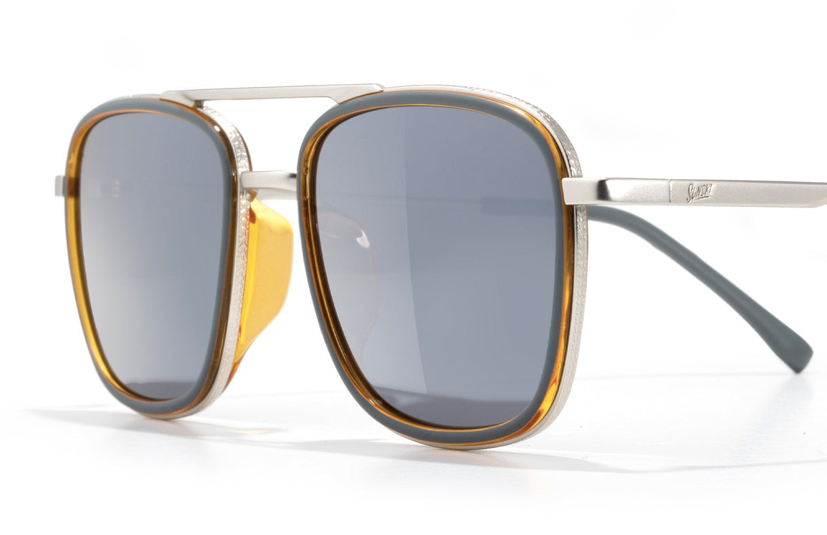 PROD_SUN_ES_SHI sunski estero storm honey silver close up three quarters angle