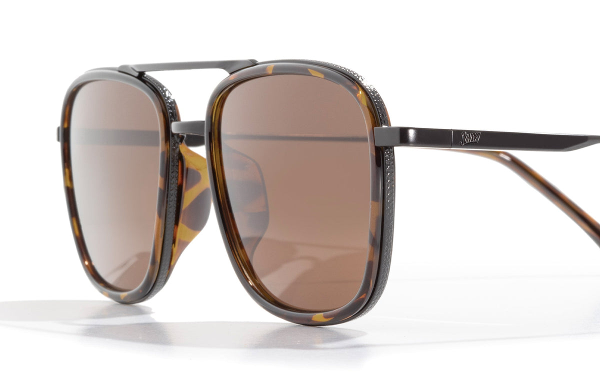 PROD_SUN_ES_TAM sunski estero tortoise amber close up three quarter angle