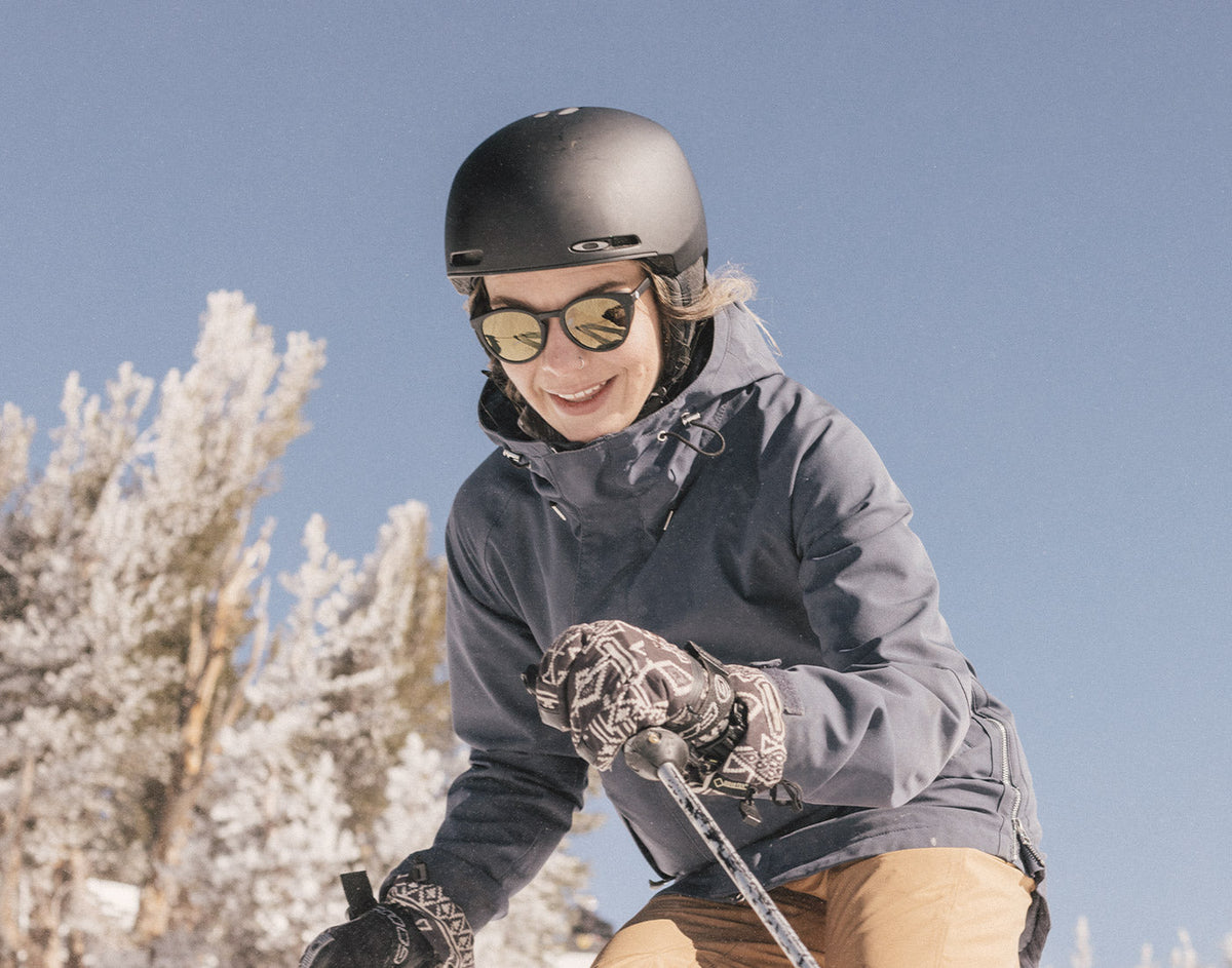 STORY woman skiing wearing sunski tera sunglasses
